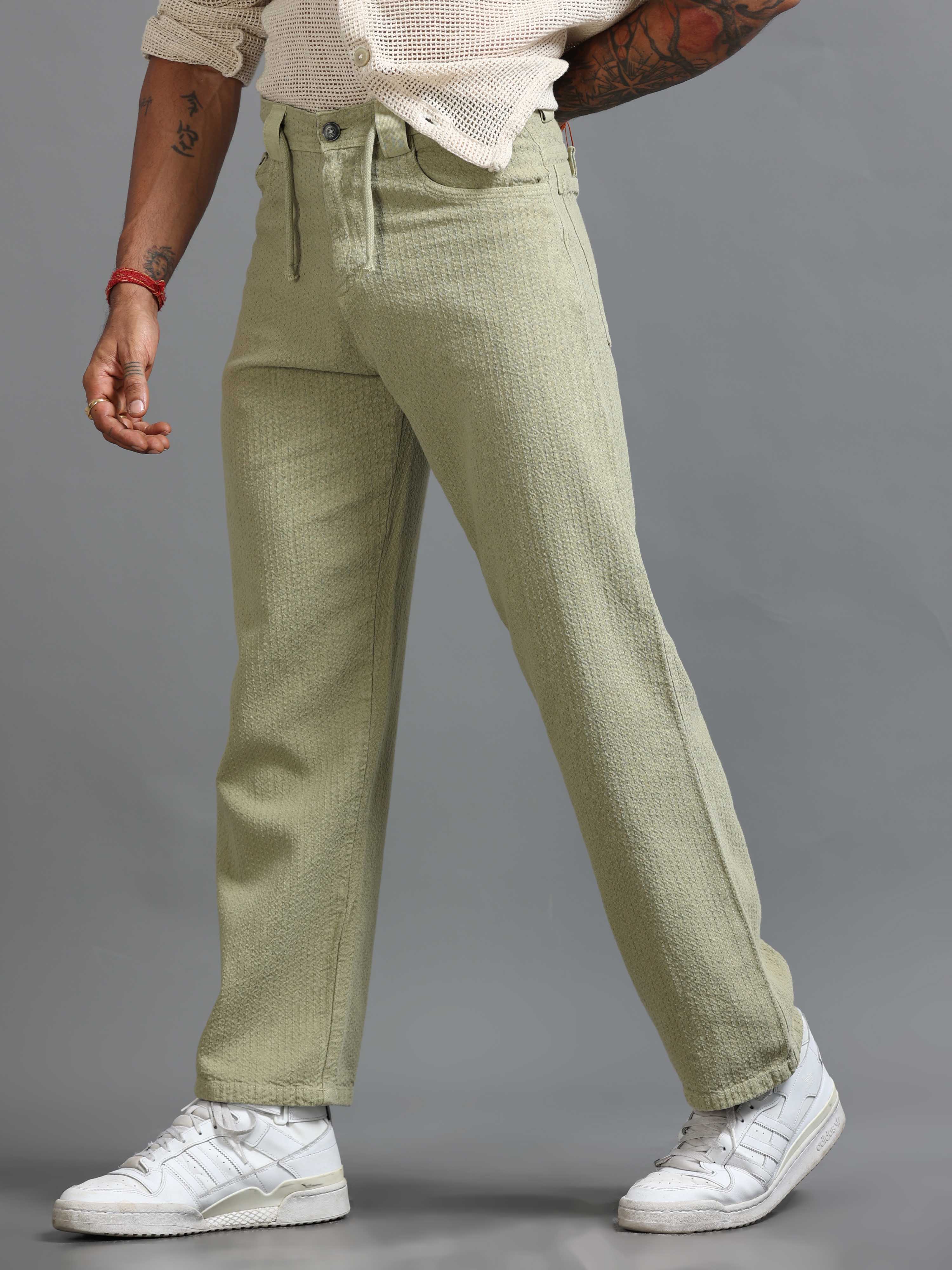Man wearing zip formal trousers with a clean shirt for modern office styling.
