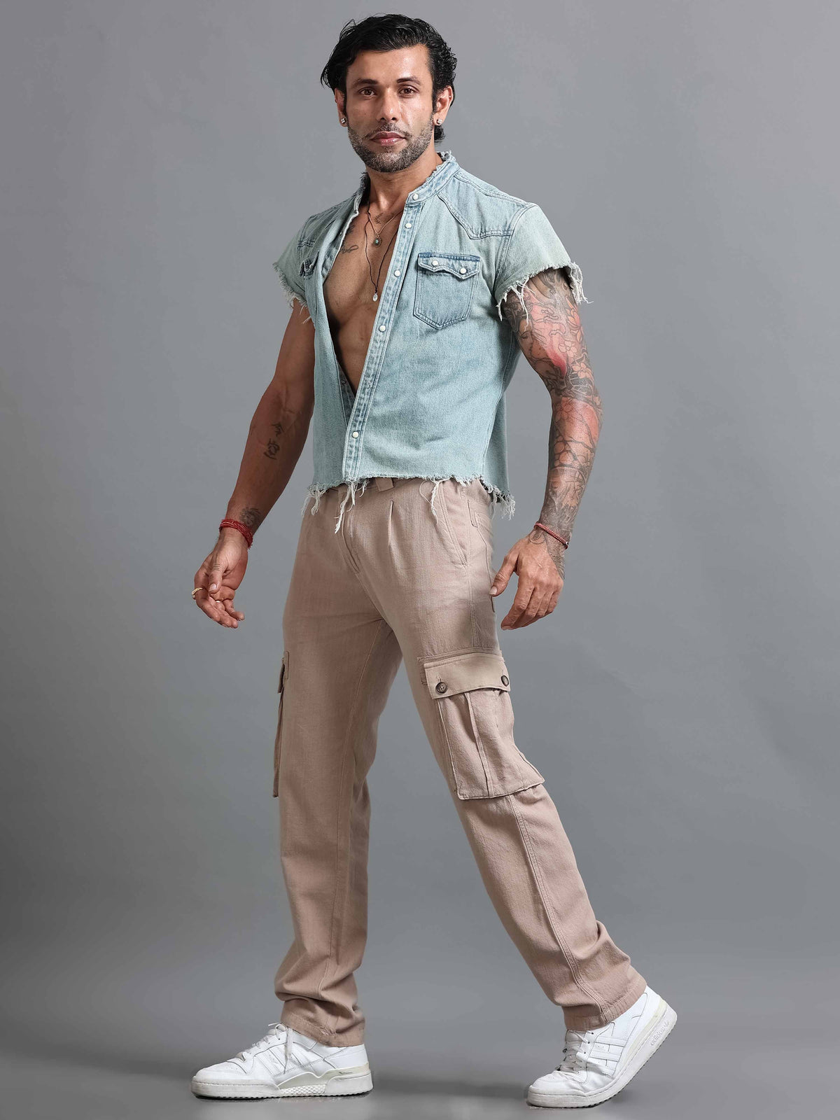 Baggy cargo pants for men styled with a fitted tee at Italian Colony