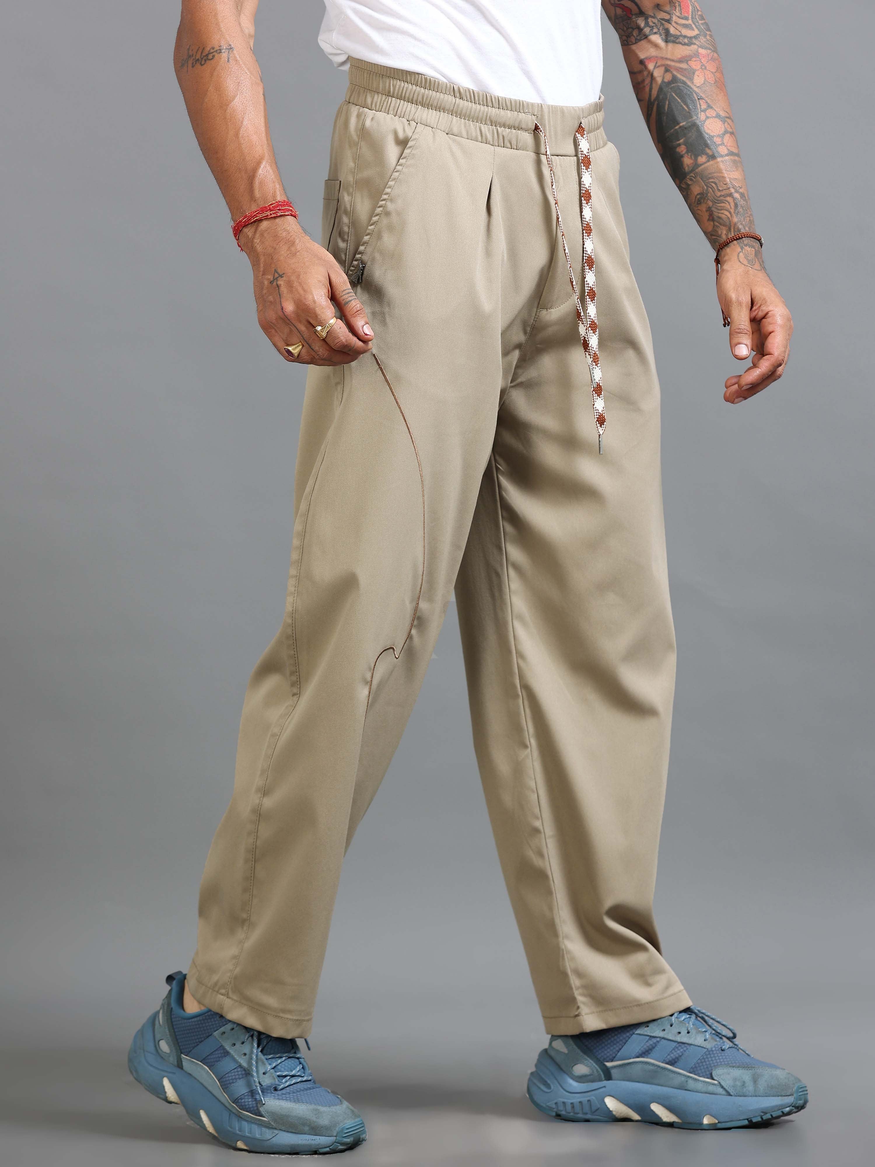 Man checking formal trousers online for fit, fabric, color, size, and office styling.