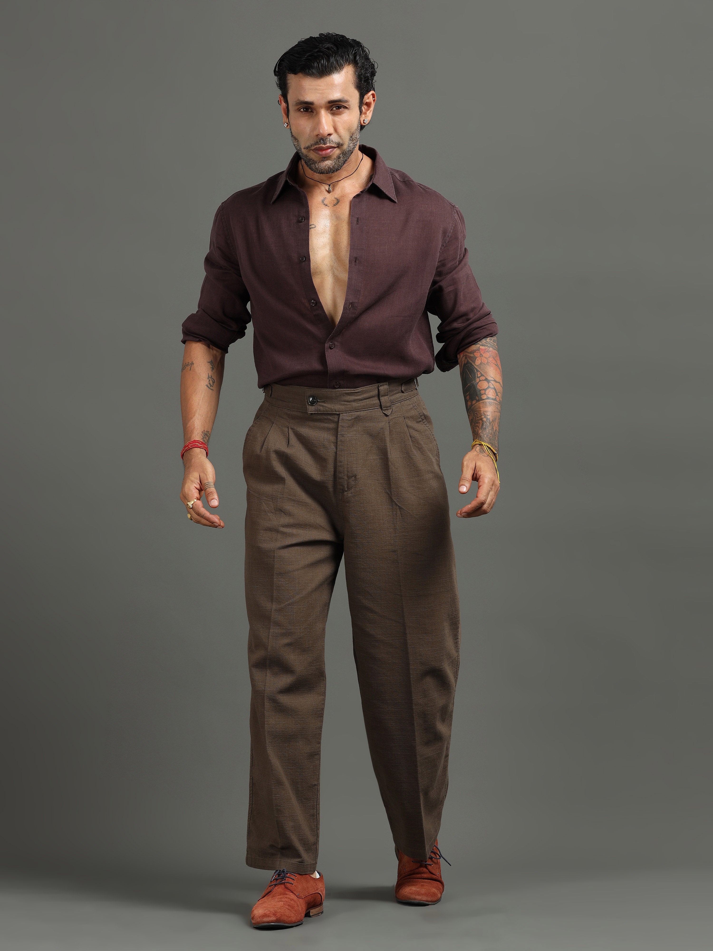 Man wearing relaxed fit trousers styled for clean daily wear and smart casual comfort.