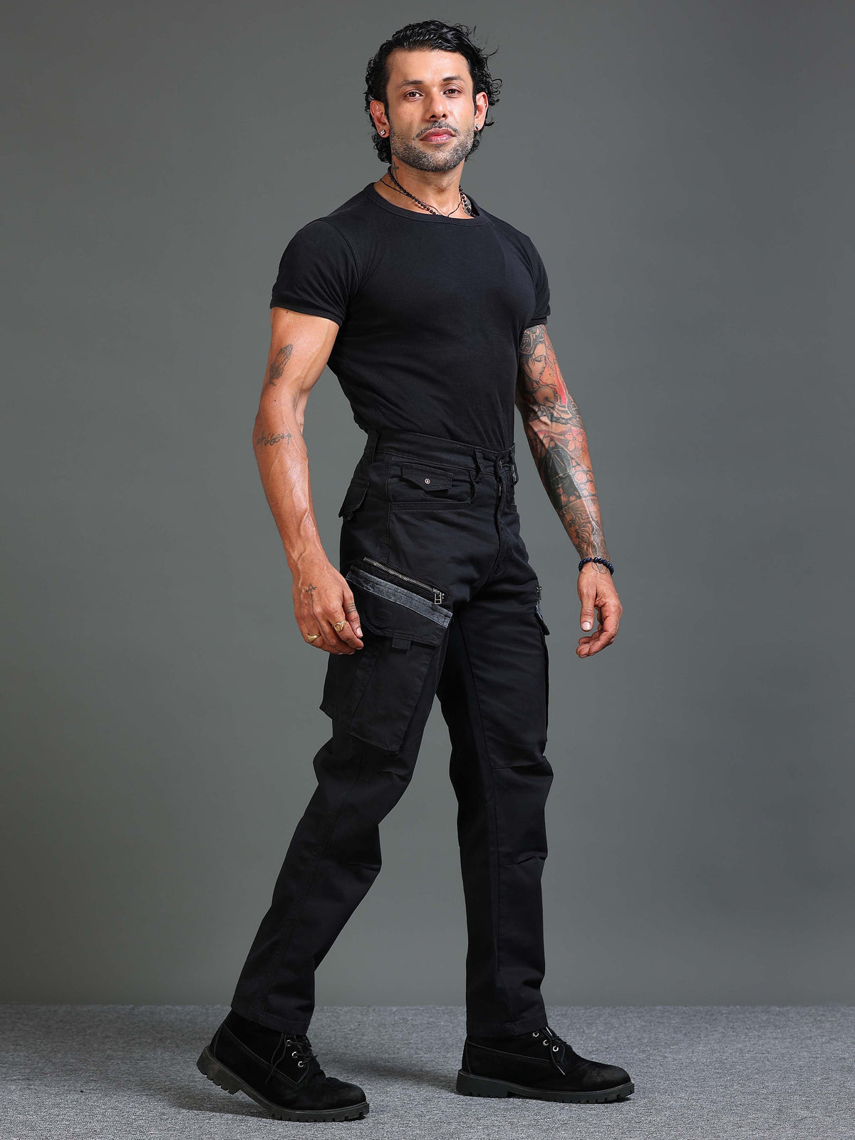 What goes with black cargo pants for men, Italian Colony · Casual: Black cargo pants with a white tee and sneakers