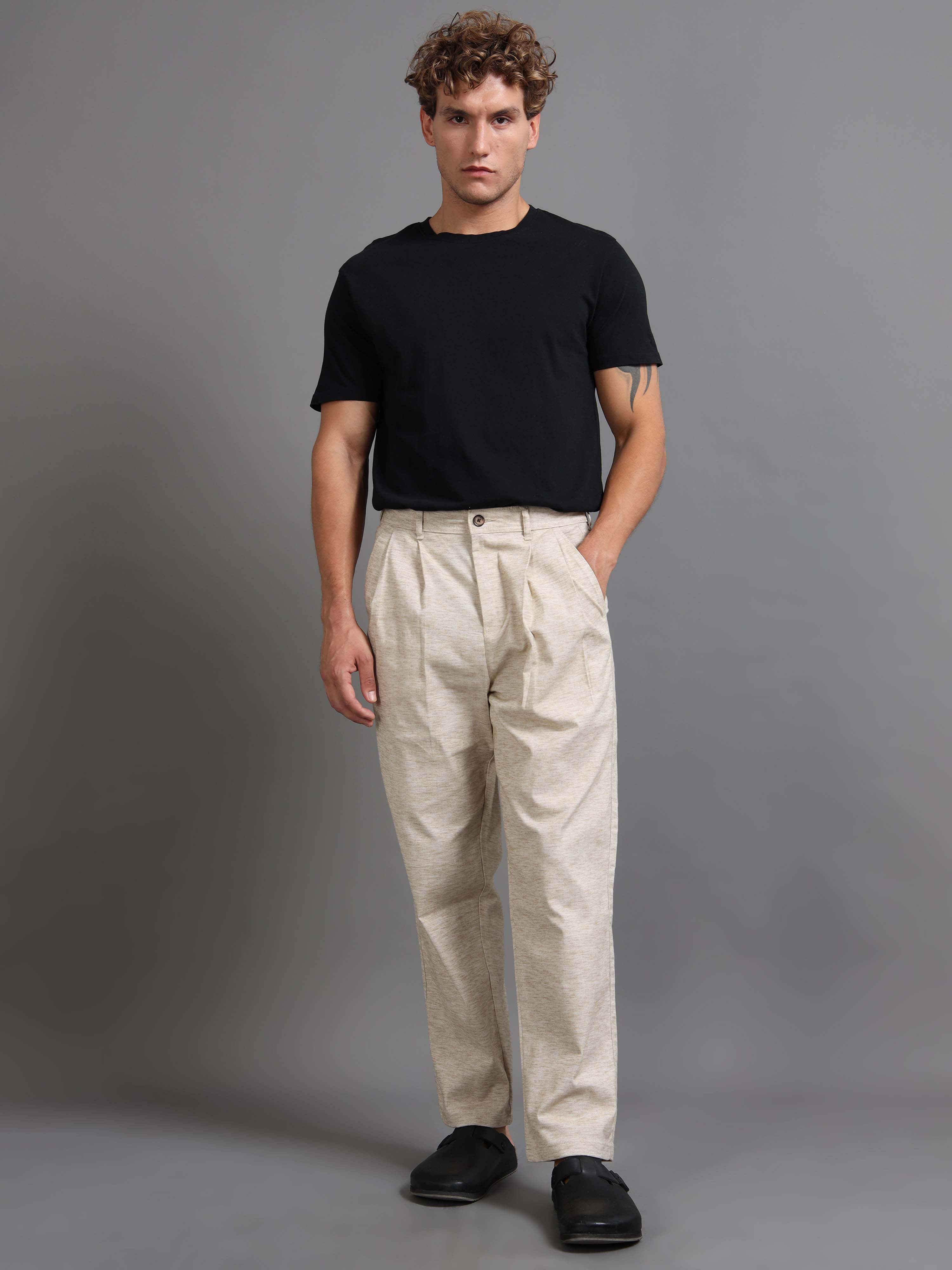Man wearing zip formal trousers styled for office and business casual looks.