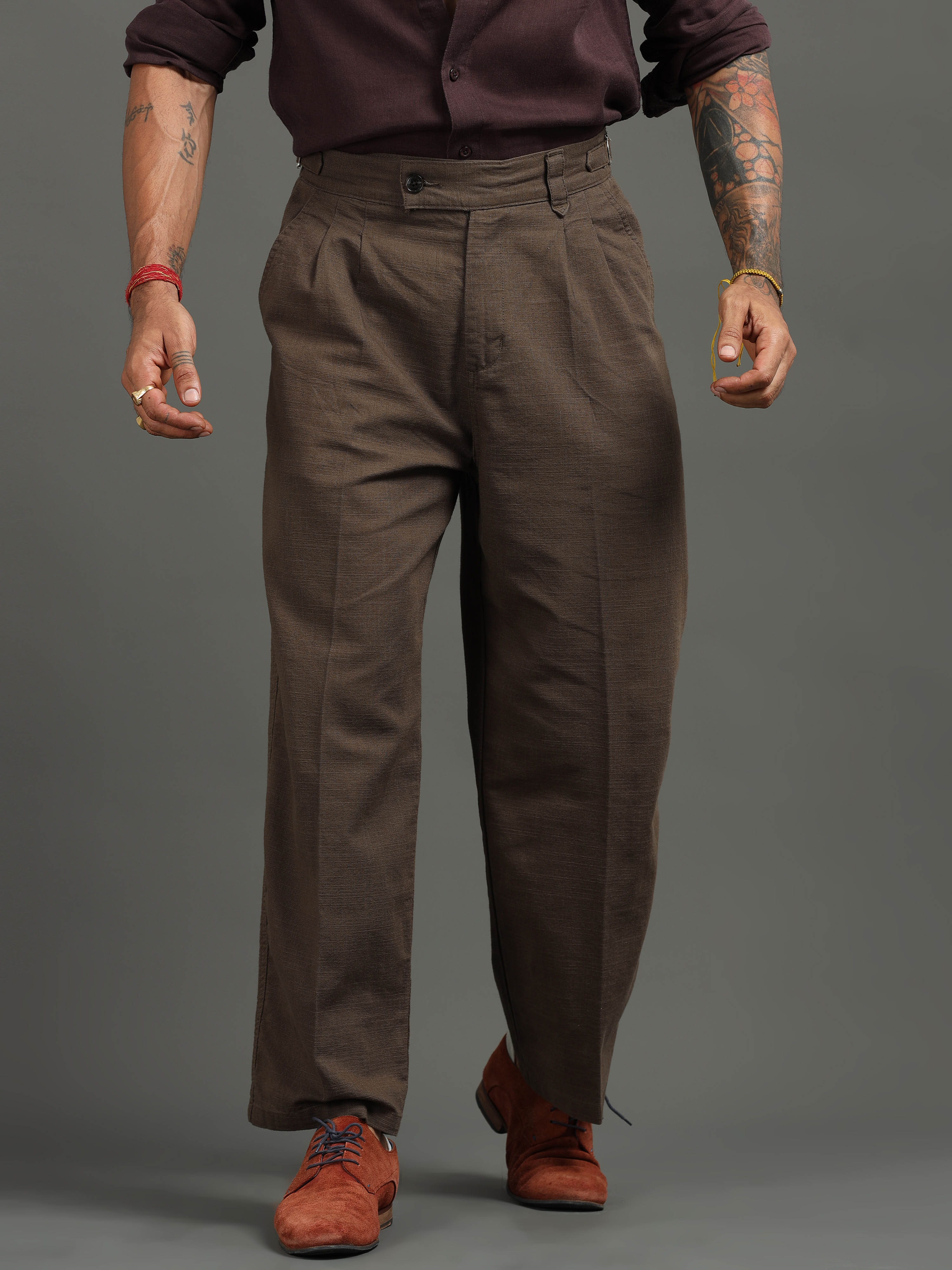 Man wearing formal trousers styled with a clean shirt for office comfort and professional daily wear.
