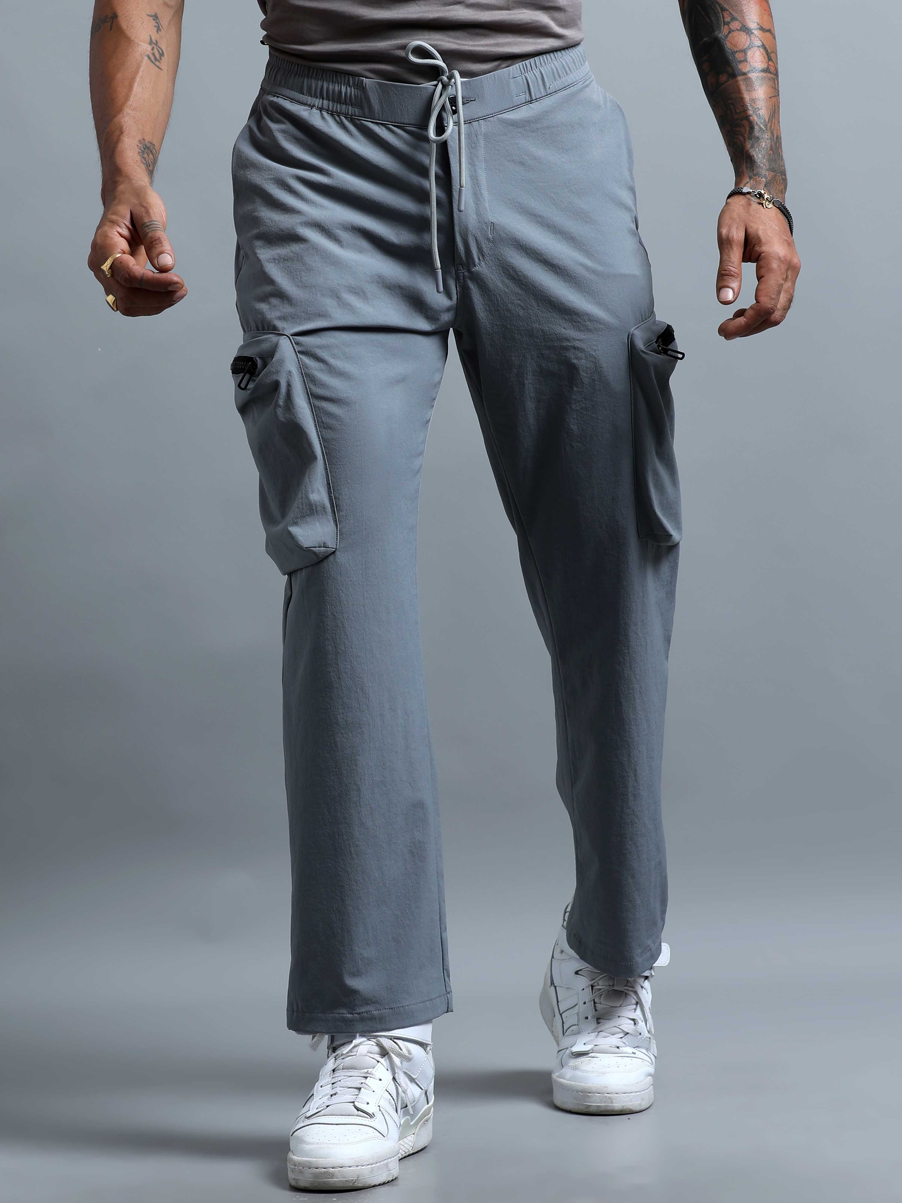 Men comparing relaxed cargo pants and engineered cargo pants for everyday utility and streetwear styling.