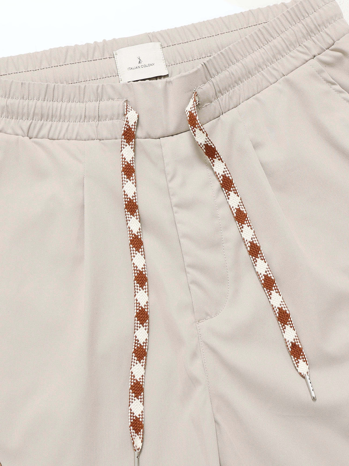 Cream Relaxed Fit Trousers for Men detail view - Flowstate Relaxed Trouser by Italian Colony